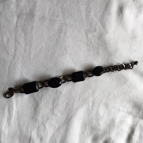 Never been used bracelet with 4 black stones. - Picture 2 of 2